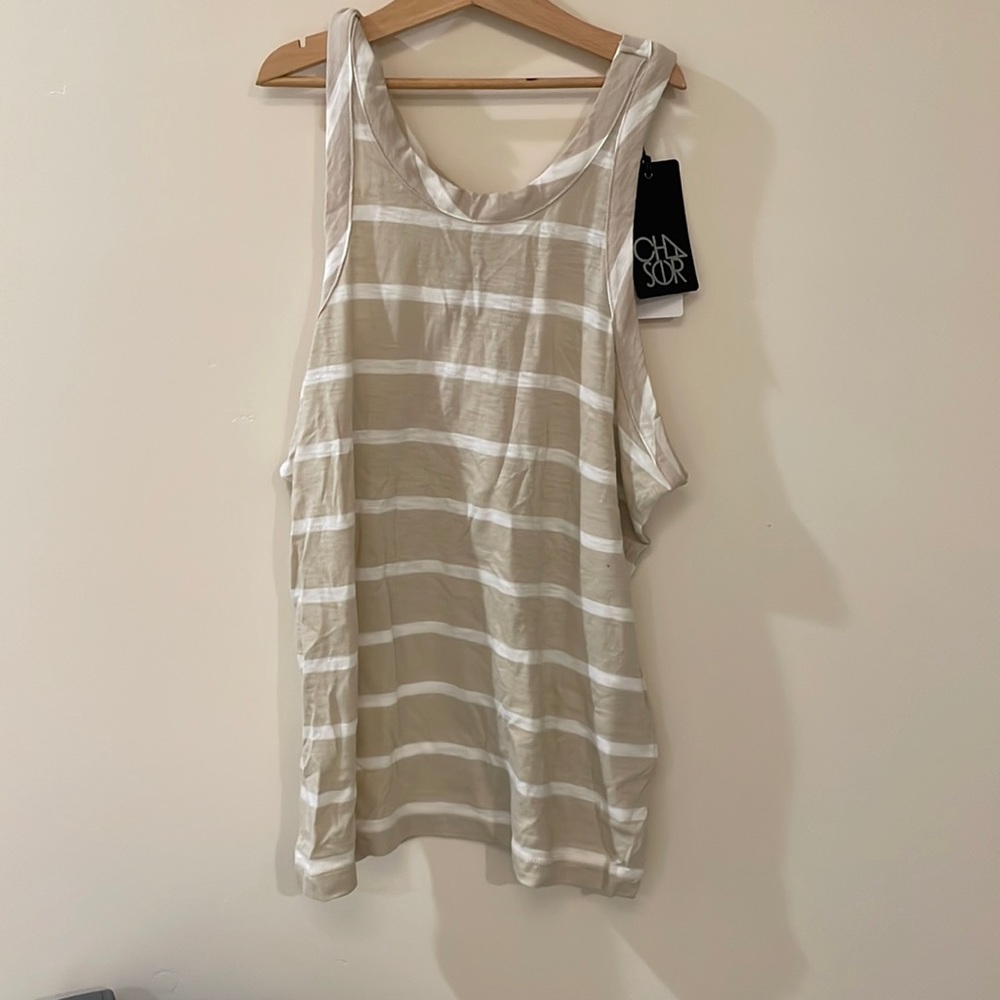 Chaser. Medium. Light brown and white.